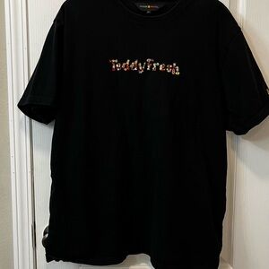 Teddy Fresh Black Tee with Multicolor Floral Logo